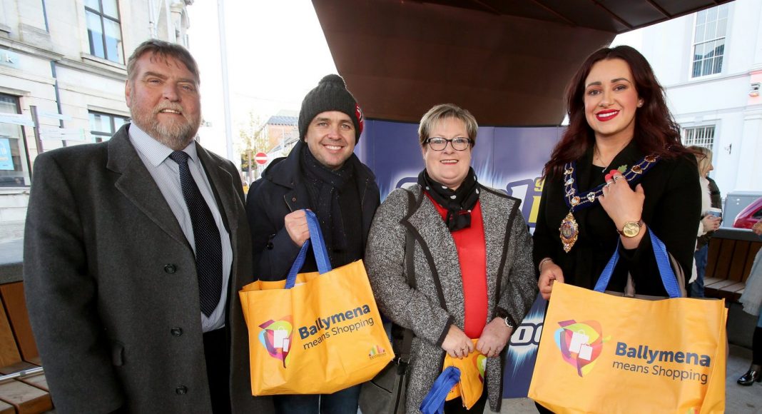 The Cool FM Roadshow with presenter, Pete Snodden, entertained the crowds during Discount Day. Pictured (L-R) are: Clive Kyle, BID Chairman, Pete Snodden, Cool FM presenter, Karen from Portadown and Mayor of Mid and East Antrim, Councillor Lindsay Millar.