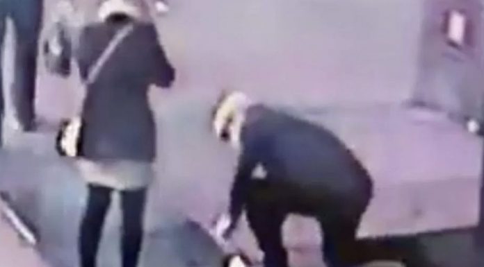 Man drops engagement ring down New York grate during proposal Footage of couple in NYC.
