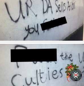 Graffiti on house wall in Martinstown.