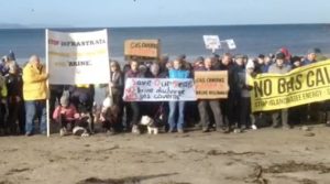 Crowds gather to protest over gas cavern plans.