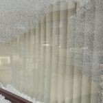 Woman in 80s left shaken after traffic cone is thrown through living room window The broken window of the property at Carrickfergus,