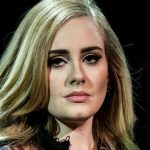 Adele shows off seven stone weight loss