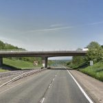 MADNESS: young people throwing stones from bridge onto motorway
