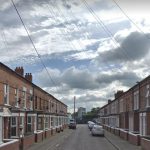 Householder hit on head with bottle after three men push their way into property