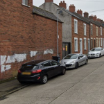 Arrest after man’s body found in north Belfast